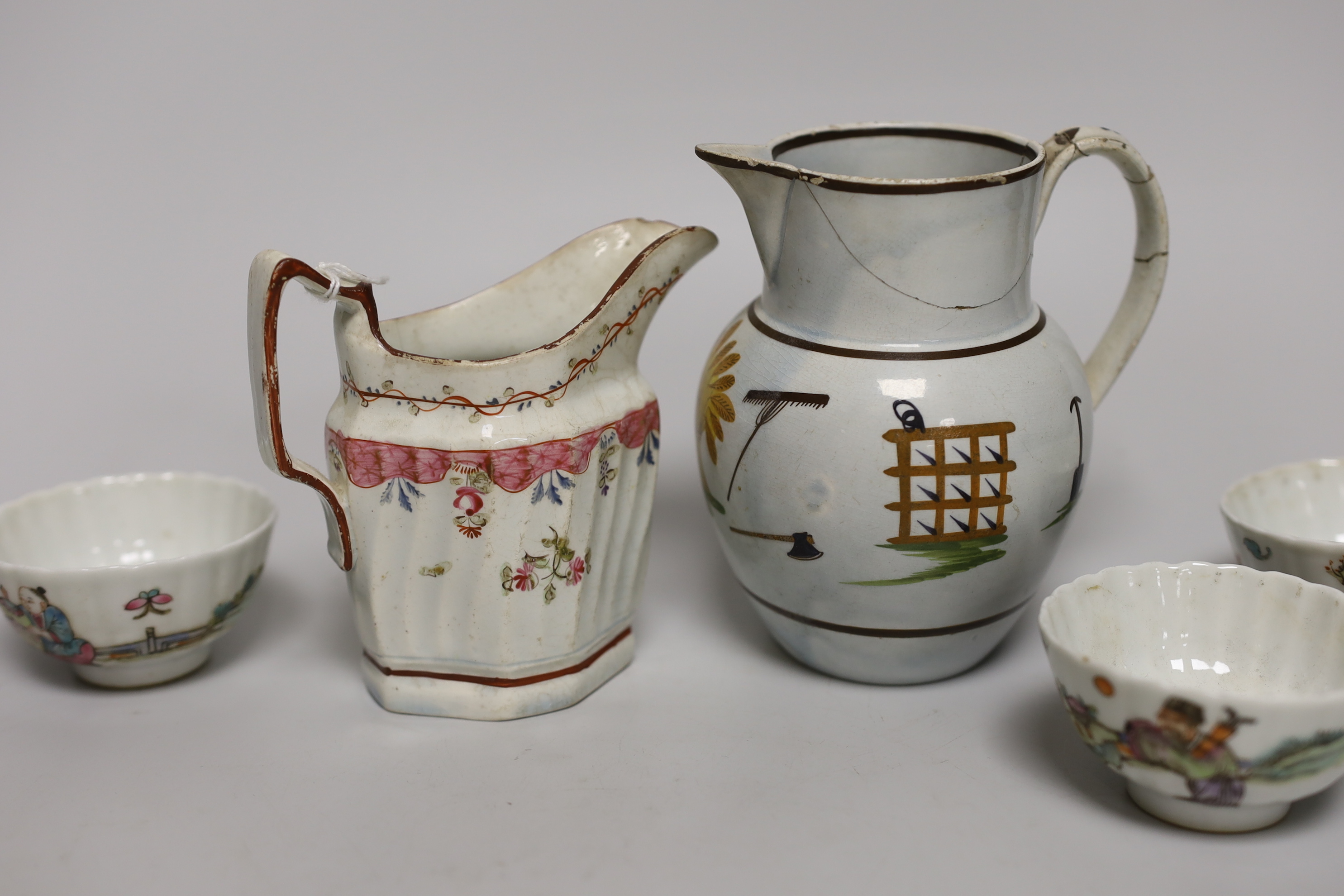 A Prattware agricultural jug and similar milk ewer, and five small Chinese tea bowls, tallest jug 12.5cm high
